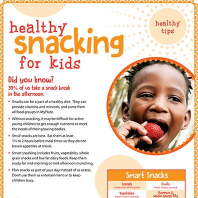 Boy eating strawberry